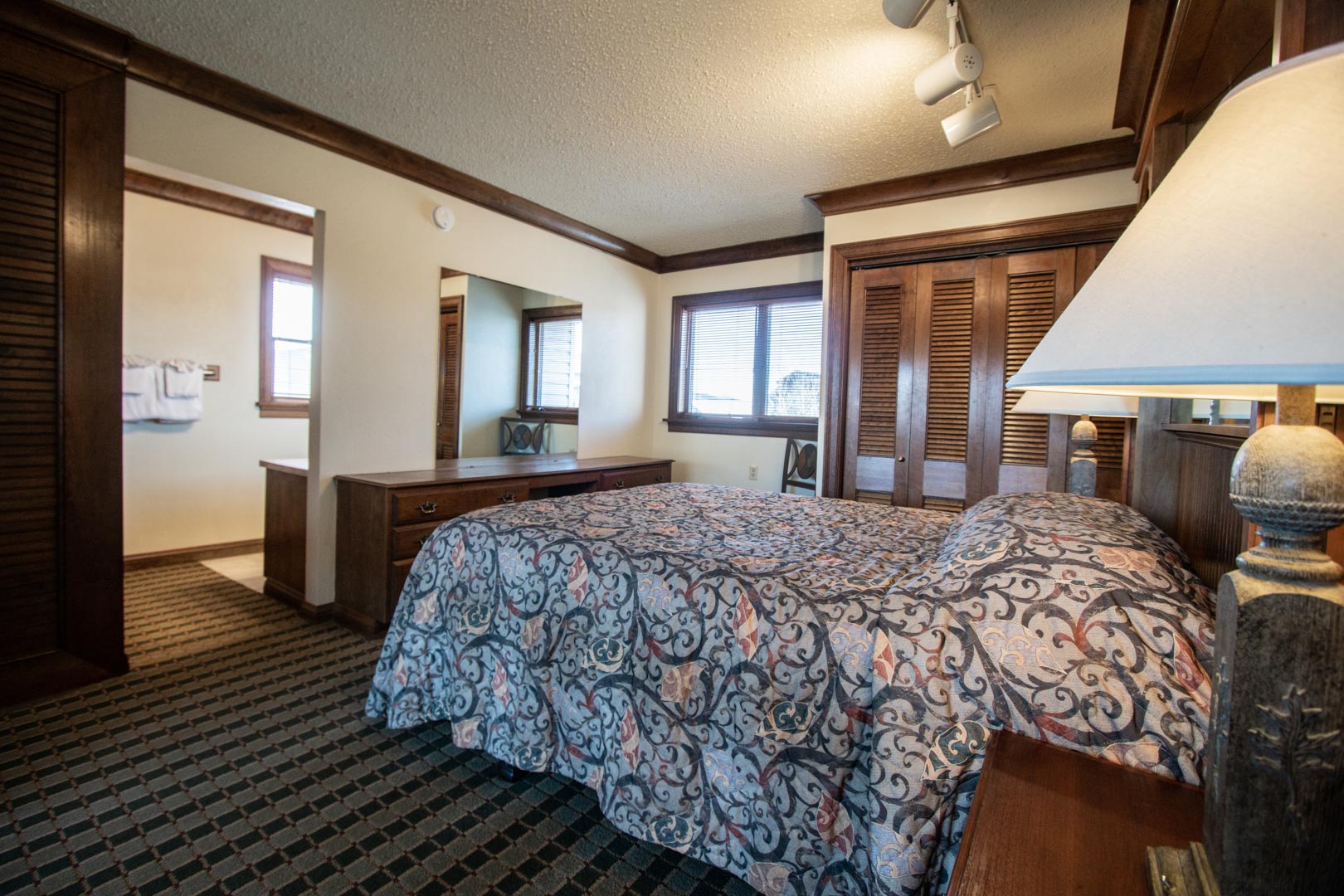 A spacious master bedroom at VRI's Sunburst Resort in Steamboat Springs, CO.